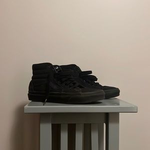 Kids black 4.5 high top vans.